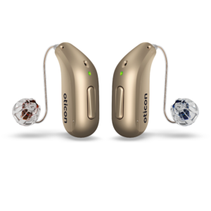 Oticon_Reveal_miniRITE_R_H2-2026_Binaural_C116HoneyBeige_Speaker60_OpenBassDome_500pctSize Oticon Reveal™ 1 MiniRITE R